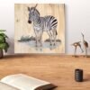 Tableau animal zèbre gravé et peint à la main, mettant en valeur la beauté sauvage et l'élégance de cet animal.